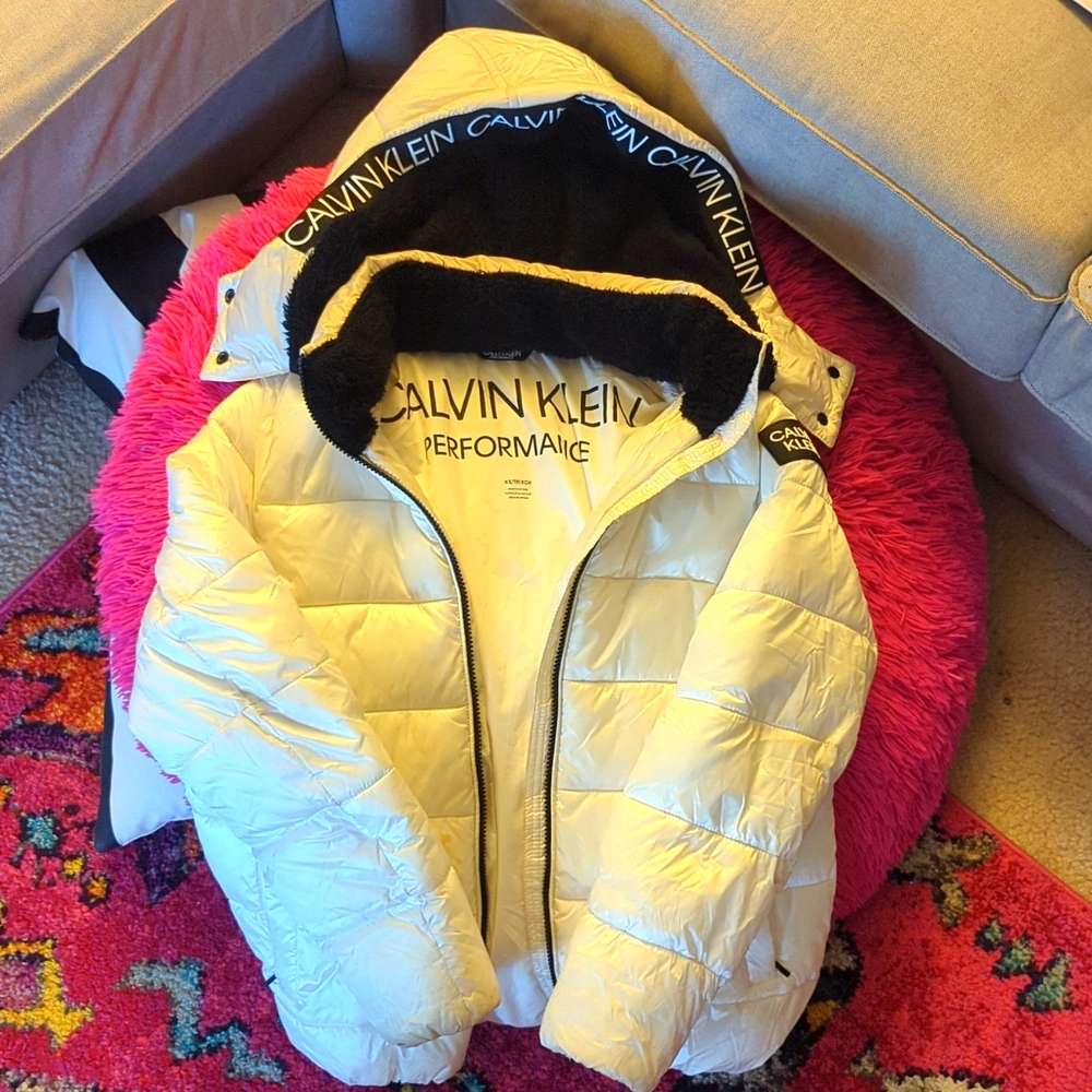 White Calvin Klein hooded puffy coat